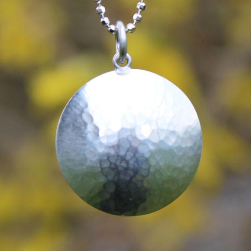Pendant of hammered silver